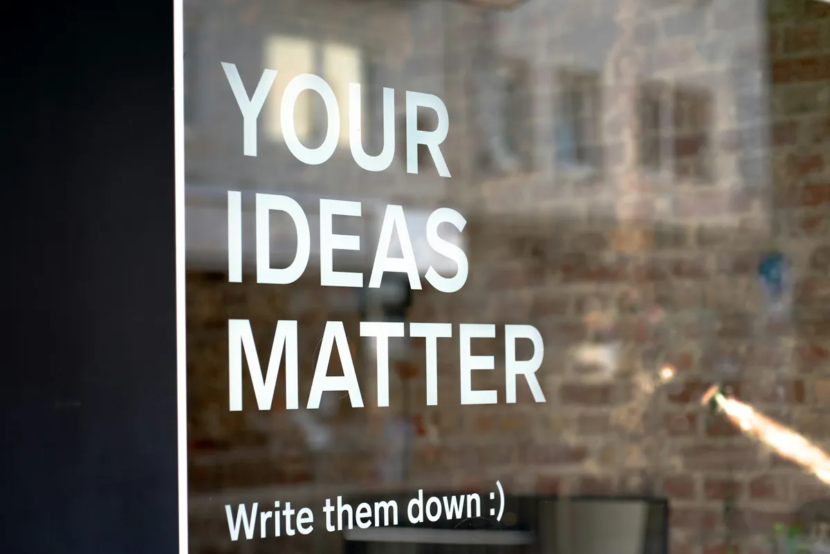 Your Ideas Matter! Write them down :) A motivational quote on a coworking space.